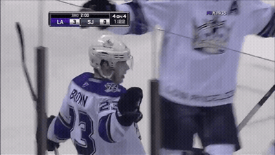 Hockey Player Brown On Jersey Standing On Ice GIF