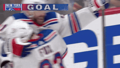 Hockey Player Celebrating Goal In Front Of New York Banner GIF