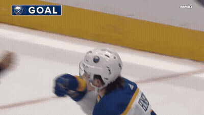 Hockey Player Celebrating Goal In Sabres Uniform GIF