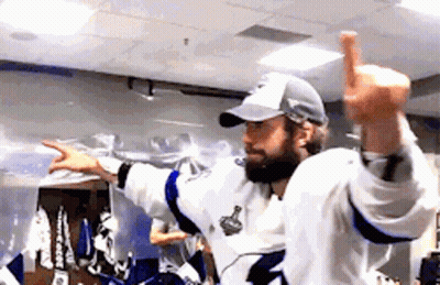 Hockey Player Giving Thumbs Up In Locker Room GIF
