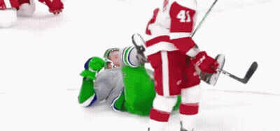 Hockey Player Hamilton Laying On Ice GIF