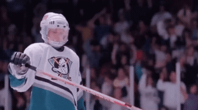 Hockey Player Holding Stick On Ice GIF