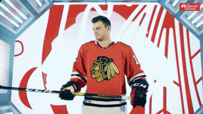 Hockey Player Holding Stick With Sportsnet Chicago Logo GIF