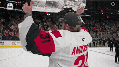 Hockey Player Holding Trophy Number 21 GIF