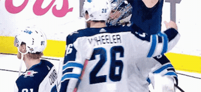 Hockey Player Hugging Another Player GIF