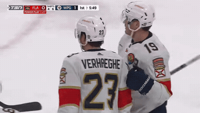 Hockey Player In 23 Jersey Talking To Player GIF