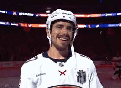 Hockey Player In Bauer Helmet And White Jersey GIF