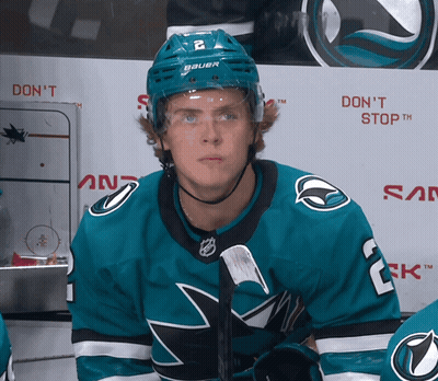 Hockey Player In Bauer Helmet Looking At Camera GIF