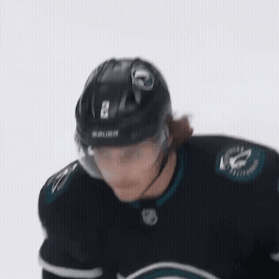 Hockey Player In Bauer Helmet Looking Down GIF