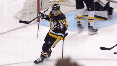 Hockey Player In Black And Yellow Jersey Number 5 GIF