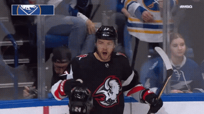 Hockey Player In Black Buffalo Jersey GIF