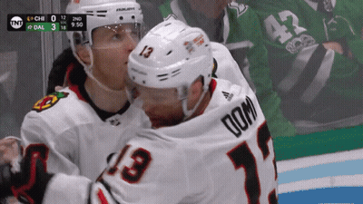 Hockey Player In Black Coca Sports Jersey GIF