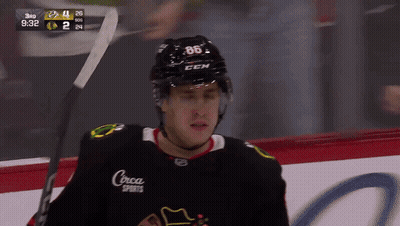 Hockey Player In Black Coca Sports Jersey GIF