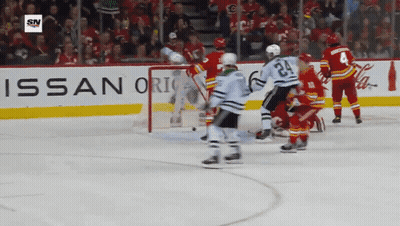 Hockey Player In Black Helmet Number 21 GIF