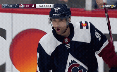 Hockey Player In Blue And White Jersey GIF