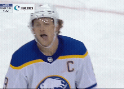 Hockey Player In Blue And White Jersey With C GIF
