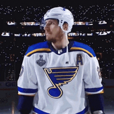 Hockey Player In Blue And White Jersey With Letter A On Ice GIF