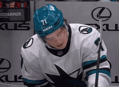 Hockey Player In Blue Helmet Number 71 GIF