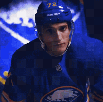 Hockey Player In Blue Jersey And Helmet GIF