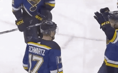Hockey Player In Blue Jersey Number 17 GIF