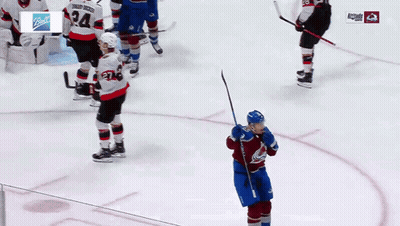 Hockey Player In Blue Jersey Number 23 GIF
