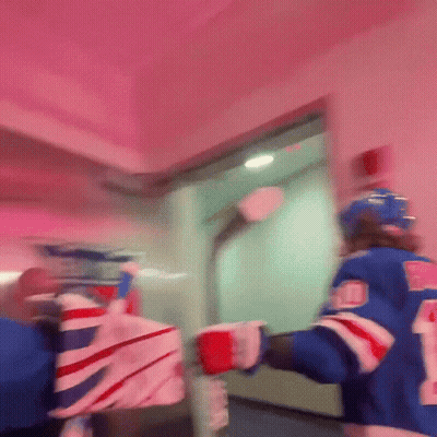 Hockey Player In Blue Jersey Number 24 GIF