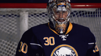 Hockey Player In Blue Jersey Number 30 GIF