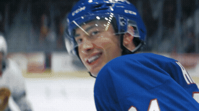 Hockey Player In Blue Jersey Number 4 GIF