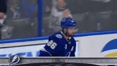 Hockey Player In Blue Jersey Number 8 GIF