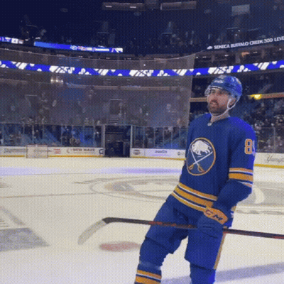 Hockey Player in Blue Jersey Number 80