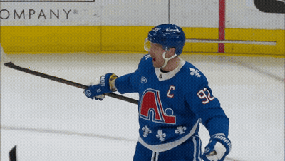 Hockey Player In Blue Jersey Number 92 GIF