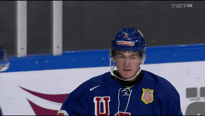 Hockey Player In Blue Jersey With Letter U GIF