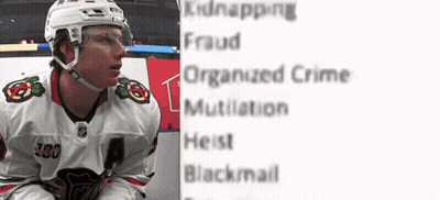 Hockey Player In Chicago Jersey Sitting On Ice GIF