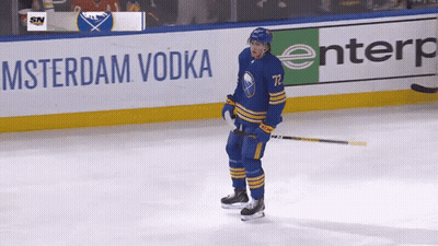 Hockey Player In Front Of Amsterdam Vodka GIF