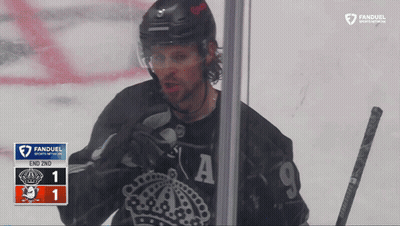 Hockey Player In Front Of Fanduel Scoreboard GIF
