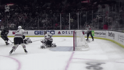 Hockey Player In Front Of Lenovo Ad GIF