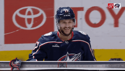 Hockey Player In Front Of Toyota Ad GIF