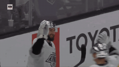 Hockey Player In Front Of Toyota Advertisement GIF