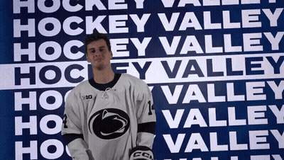 Hockey Player In Front Of Valley Hockey Wall GIF