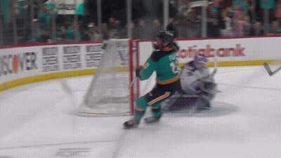 Hockey Player In Green Jersey Number 13 GIF