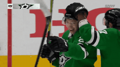 Hockey Player In Green Jersey Number 2 GIF
