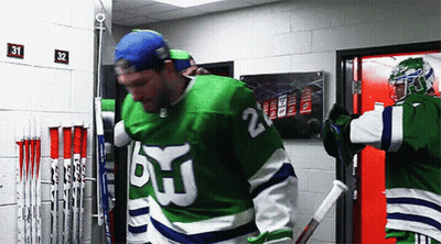 Hockey Player In Green Jersey Number 2 GIF