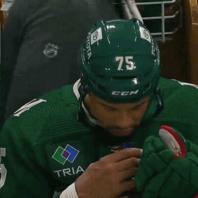 Hockey Player In Green Jersey With M GIF