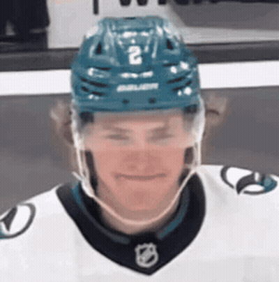 Hockey Player In Helmet Number 2 Smiling GIF