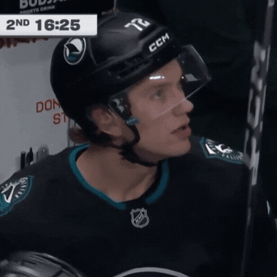 Hockey Player In Helmet Number 72 GIF