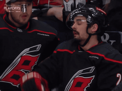 Hockey Player In Jersey Number 4 GIF