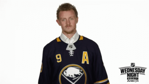 Hockey Player In Jersey Saying 9 A GIF