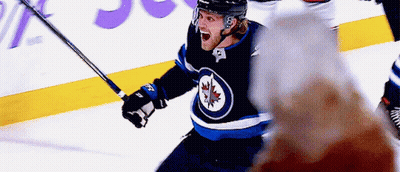 Hockey Player In Maple Leaf Jersey Celebrating Goal GIF