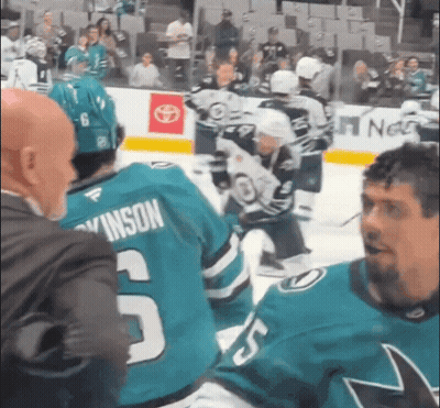 Hockey Player In Number 5 Jersey Talking To Another Player GIF