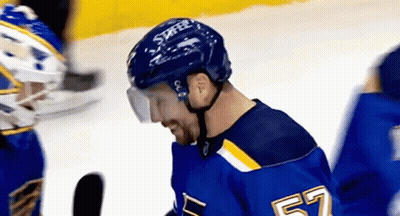 Hockey Player In Number 57 Jersey On Ice GIF